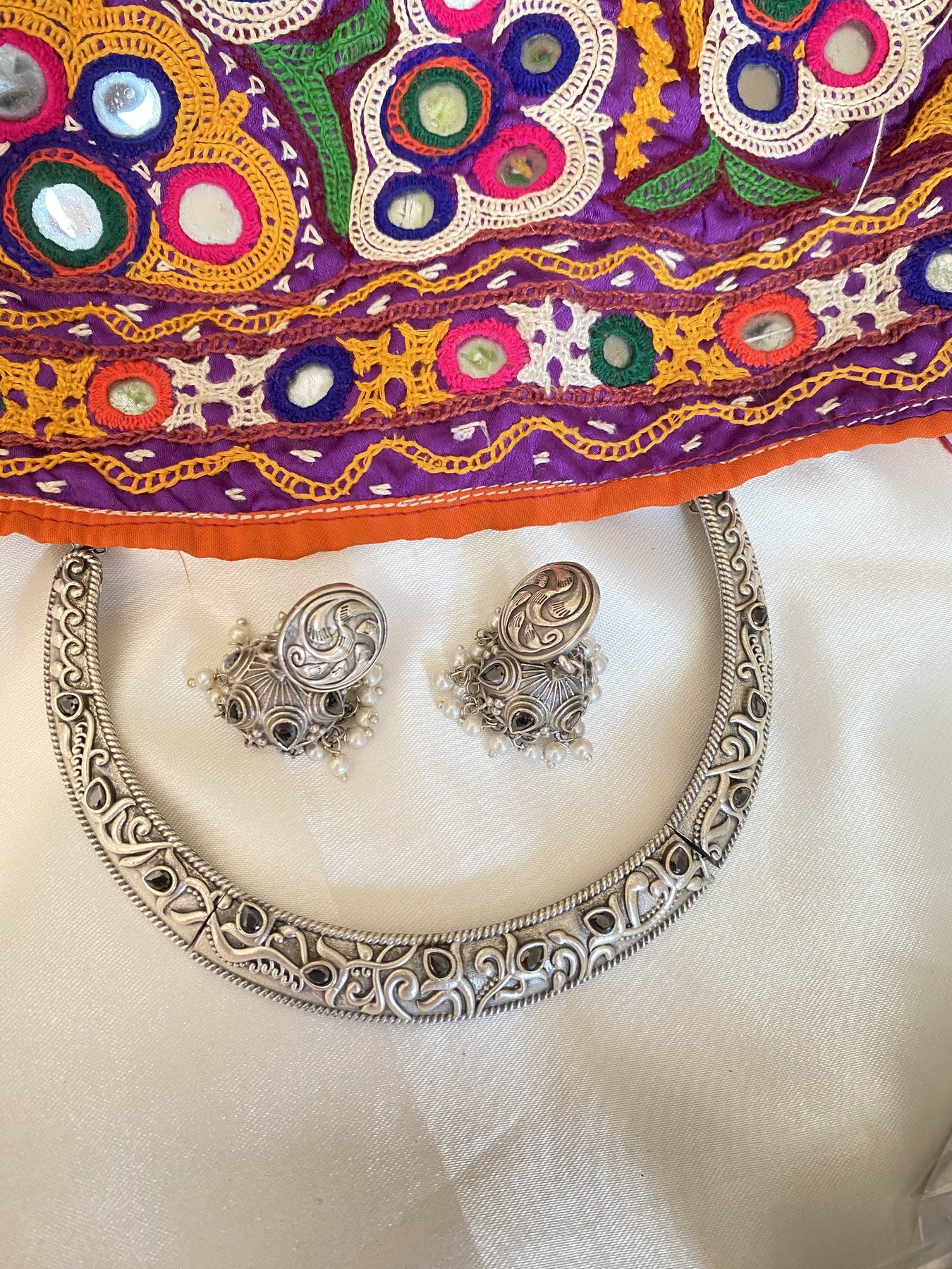 Pankhuri Silver Hansli - handcrafted traditional necklace by Aabhushan Jewellery